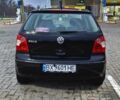 Черный Фольксваген Поло, объемом двигателя 1.2 л и пробегом 219 тыс. км за 3950 $, фото 1 на Automoto.ua