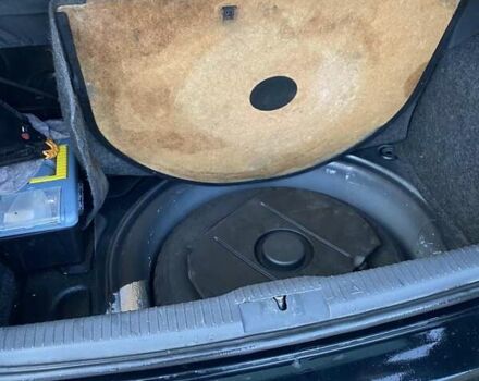 Черный Фольксваген Поло, объемом двигателя 1.4 л и пробегом 226 тыс. км за 3400 $, фото 7 на Automoto.ua