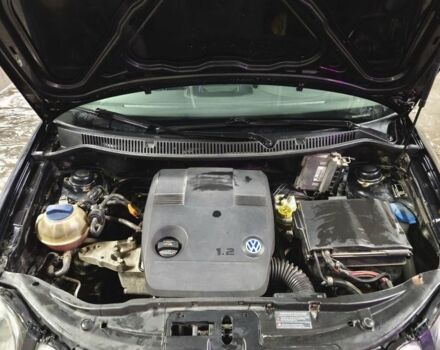 Черный Фольксваген Поло, объемом двигателя 1.2 л и пробегом 219 тыс. км за 3950 $, фото 5 на Automoto.ua