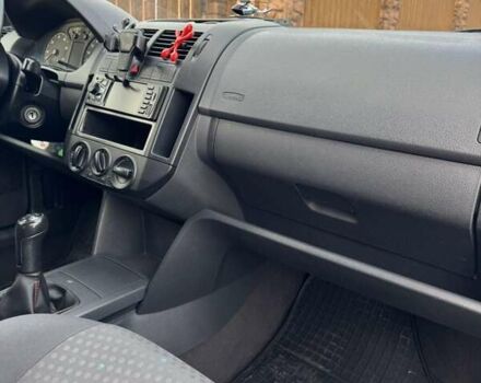 Черный Фольксваген Поло, объемом двигателя 1.2 л и пробегом 160 тыс. км за 4300 $, фото 11 на Automoto.ua