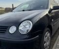 Черный Фольксваген Поло, объемом двигателя 1.2 л и пробегом 160 тыс. км за 4300 $, фото 1 на Automoto.ua