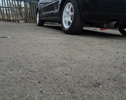 Черный Фольксваген Поло, объемом двигателя 1.2 л и пробегом 240 тыс. км за 2000 $, фото 1 на Automoto.ua