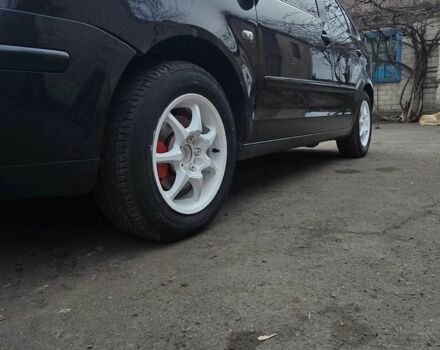 Черный Фольксваген Поло, объемом двигателя 1.2 л и пробегом 240 тыс. км за 2000 $, фото 2 на Automoto.ua