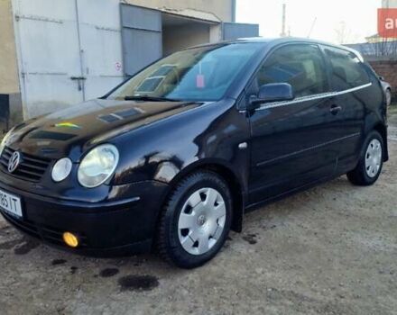 Черный Фольксваген Поло, объемом двигателя 1.4 л и пробегом 290 тыс. км за 4000 $, фото 1 на Automoto.ua