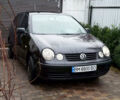 Черный Фольксваген Поло, объемом двигателя 1.4 л и пробегом 245 тыс. км за 4100 $, фото 1 на Automoto.ua