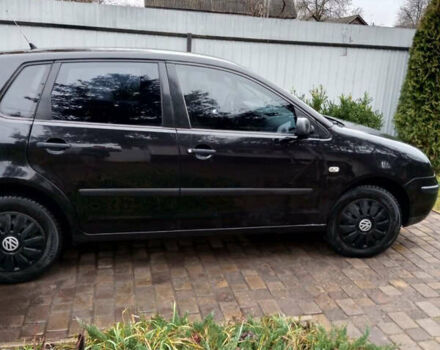 Черный Фольксваген Поло, объемом двигателя 1.4 л и пробегом 245 тыс. км за 4100 $, фото 5 на Automoto.ua