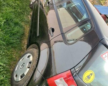 Черный Фольксваген Поло, объемом двигателя 1.4 л и пробегом 125 тыс. км за 5650 $, фото 1 на Automoto.ua