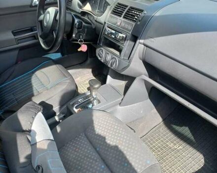 Черный Фольксваген Поло, объемом двигателя 1.4 л и пробегом 125 тыс. км за 5650 $, фото 17 на Automoto.ua