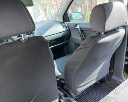 Черный Фольксваген Поло, объемом двигателя 1.4 л и пробегом 125 тыс. км за 5650 $, фото 4 на Automoto.ua