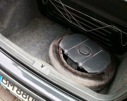 Черный Фольксваген Поло, объемом двигателя 1.4 л и пробегом 245 тыс. км за 4100 $, фото 17 на Automoto.ua