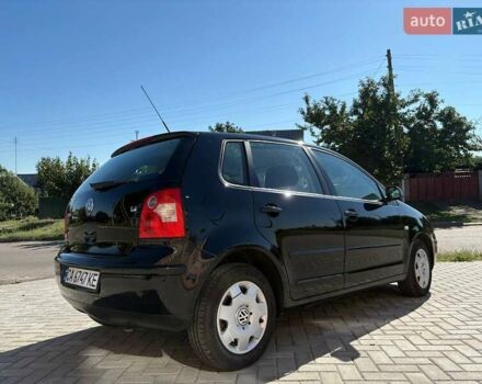 Черный Фольксваген Поло, объемом двигателя 1.4 л и пробегом 145 тыс. км за 5499 $, фото 11 на Automoto.ua