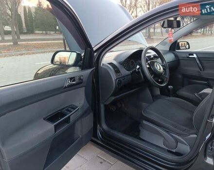 Чорний Фольксваген Поло, об'ємом двигуна 1.39 л та пробігом 178 тис. км за 4200 $, фото 21 на Automoto.ua
