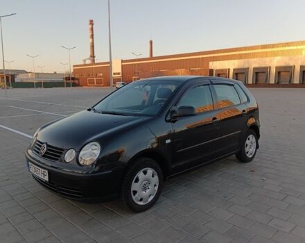 Черный Фольксваген Поло, объемом двигателя 1.4 л и пробегом 183 тыс. км за 4200 $, фото 2 на Automoto.ua