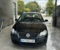 Черный Фольксваген Поло, объемом двигателя 1.4 л и пробегом 240 тыс. км за 3800 $, фото 2 на Automoto.ua