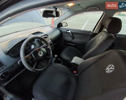 Чорний Фольксваген Поло, об'ємом двигуна 1.39 л та пробігом 178 тис. км за 4200 $, фото 17 на Automoto.ua