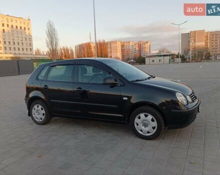 Чорний Фольксваген Поло, об'ємом двигуна 1.39 л та пробігом 178 тис. км за 4200 $, фото 12 на Automoto.ua