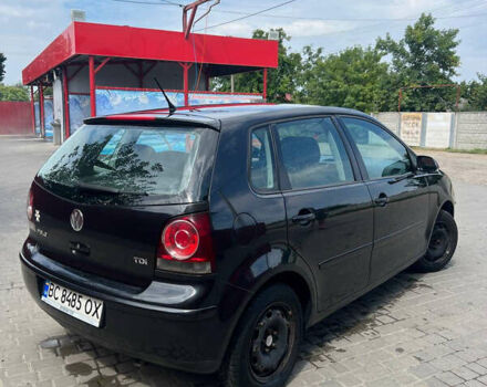 Черный Фольксваген Поло, объемом двигателя 1.4 л и пробегом 250 тыс. км за 4600 $, фото 4 на Automoto.ua