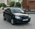 Черный Фольксваген Поло, объемом двигателя 1.39 л и пробегом 223 тыс. км за 3999 $, фото 1 на Automoto.ua