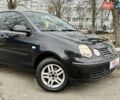 Чорний Фольксваген Поло, об'ємом двигуна 1.4 л та пробігом 188 тис. км за 3990 $, фото 1 на Automoto.ua