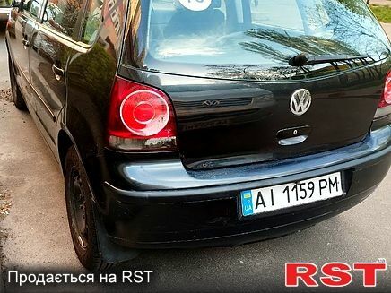 Черный Фольксваген Поло, объемом двигателя 1.4 л и пробегом 322 тыс. км за 4500 $, фото 1 на Automoto.ua
