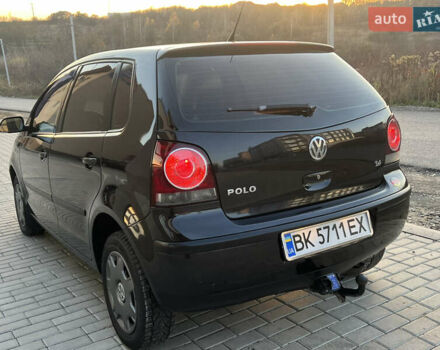 Черный Фольксваген Поло, объемом двигателя 1.4 л и пробегом 159 тыс. км за 4599 $, фото 7 на Automoto.ua