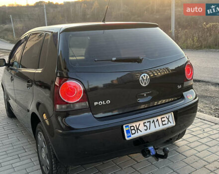 Черный Фольксваген Поло, объемом двигателя 1.4 л и пробегом 159 тыс. км за 4599 $, фото 8 на Automoto.ua