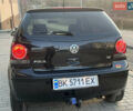 Черный Фольксваген Поло, объемом двигателя 1.4 л и пробегом 159 тыс. км за 4599 $, фото 9 на Automoto.ua