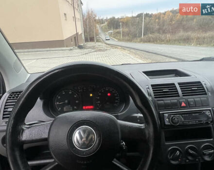 Чорний Фольксваген Поло, об'ємом двигуна 1.4 л та пробігом 159 тис. км за 4599 $, фото 29 на Automoto.ua