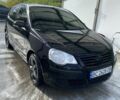 Черный Фольксваген Поло, объемом двигателя 1.4 л и пробегом 256 тыс. км за 4400 $, фото 1 на Automoto.ua