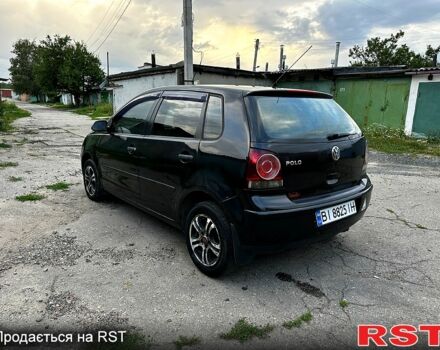 Черный Фольксваген Поло, объемом двигателя 1.4 л и пробегом 220 тыс. км за 4900 $, фото 2 на Automoto.ua