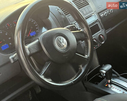 Черный Фольксваген Поло, объемом двигателя 1.4 л и пробегом 159 тыс. км за 4599 $, фото 23 на Automoto.ua