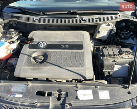 Черный Фольксваген Поло, объемом двигателя 1.39 л и пробегом 240 тыс. км за 4400 $, фото 27 на Automoto.ua