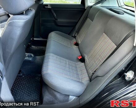 Черный Фольксваген Поло, объемом двигателя 1.4 л и пробегом 220 тыс. км за 4900 $, фото 7 на Automoto.ua