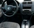 Черный Фольксваген Поло, объемом двигателя 1.4 л и пробегом 220 тыс. км за 4900 $, фото 9 на Automoto.ua