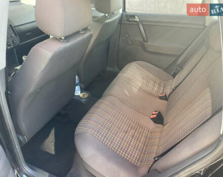 Черный Фольксваген Поло, объемом двигателя 1.4 л и пробегом 158 тыс. км за 4999 $, фото 12 на Automoto.ua