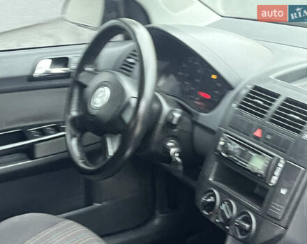 Чорний Фольксваген Поло, об'ємом двигуна 1.4 л та пробігом 159 тис. км за 4599 $, фото 26 на Automoto.ua