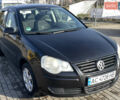 Черный Фольксваген Поло, объемом двигателя 1.39 л и пробегом 240 тыс. км за 4400 $, фото 1 на Automoto.ua