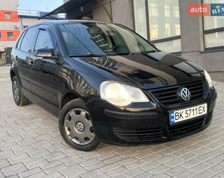 Черный Фольксваген Поло, объемом двигателя 1.4 л и пробегом 159 тыс. км за 4599 $, фото 14 на Automoto.ua