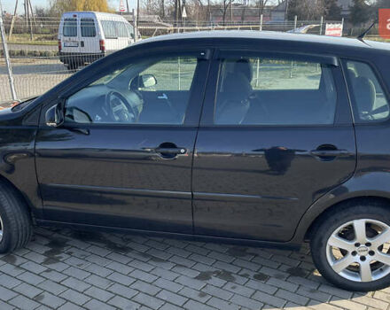 Черный Фольксваген Поло, объемом двигателя 1.39 л и пробегом 240 тыс. км за 4400 $, фото 3 на Automoto.ua