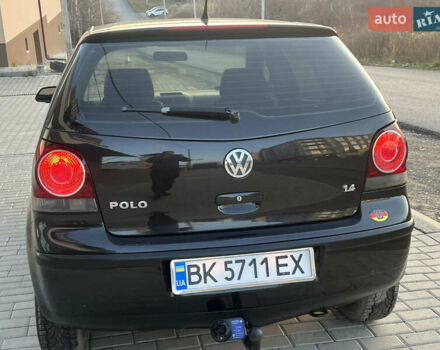 Черный Фольксваген Поло, объемом двигателя 1.4 л и пробегом 159 тыс. км за 4599 $, фото 10 на Automoto.ua