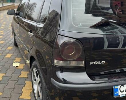 Черный Фольксваген Поло, объемом двигателя 1.4 л и пробегом 212 тыс. км за 4500 $, фото 7 на Automoto.ua