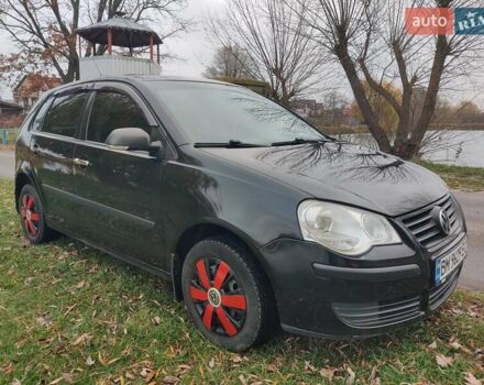 Черный Фольксваген Поло, объемом двигателя 1.4 л и пробегом 170 тыс. км за 5900 $, фото 1 на Automoto.ua