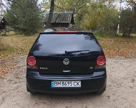 Черный Фольксваген Поло, объемом двигателя 1.4 л и пробегом 275 тыс. км за 4600 $, фото 9 на Automoto.ua