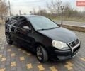 Черный Фольксваген Поло, объемом двигателя 1.4 л и пробегом 212 тыс. км за 4500 $, фото 1 на Automoto.ua