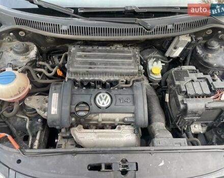 Черный Фольксваген Поло, объемом двигателя 1.4 л и пробегом 114 тыс. км за 6499 $, фото 27 на Automoto.ua