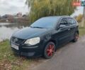 Черный Фольксваген Поло, объемом двигателя 1.4 л и пробегом 170 тыс. км за 5900 $, фото 1 на Automoto.ua
