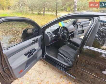 Черный Фольксваген Поло, объемом двигателя 1.4 л и пробегом 275 тыс. км за 4600 $, фото 10 на Automoto.ua