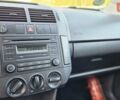 Черный Фольксваген Поло, объемом двигателя 1.4 л и пробегом 177 тыс. км за 4850 $, фото 62 на Automoto.ua