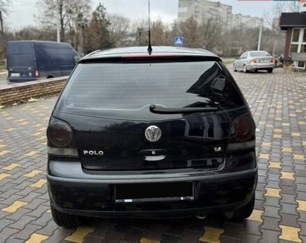 Черный Фольксваген Поло, объемом двигателя 1.4 л и пробегом 212 тыс. км за 4500 $, фото 4 на Automoto.ua