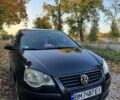 Чорний Фольксваген Поло, об'ємом двигуна 1.4 л та пробігом 165 тис. км за 4699 $, фото 1 на Automoto.ua